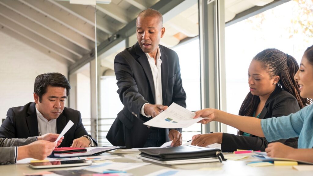 meeting going on table with boss